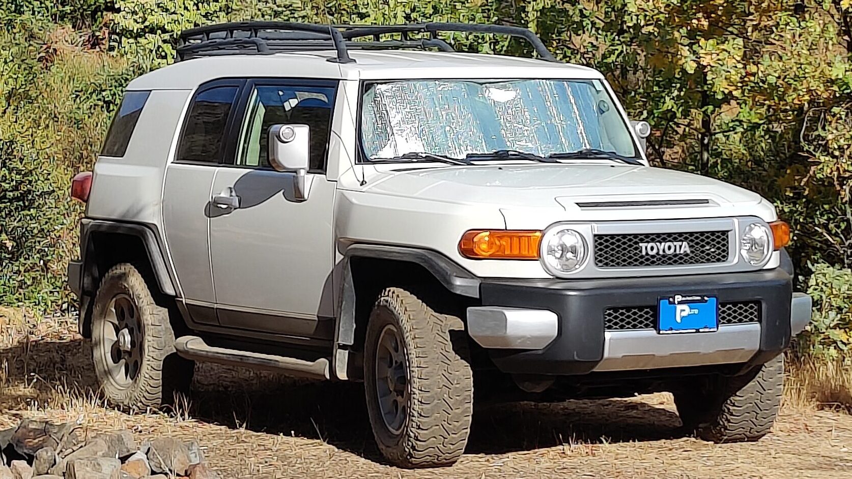 FJ13 parked along a creek in the Rogue River-Siskiyou National Forest.